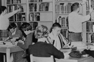 Pictured are some of our first students as they study in the library.