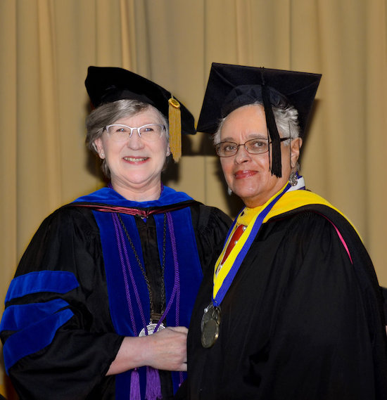 President Godwin bestowing the distinction of Professor Emeritus to Maureen Norman in 2018.