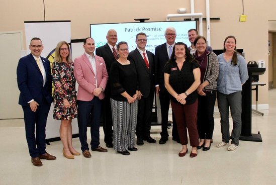 Members of PCEF celebrate the announcement of Patrick Promise.